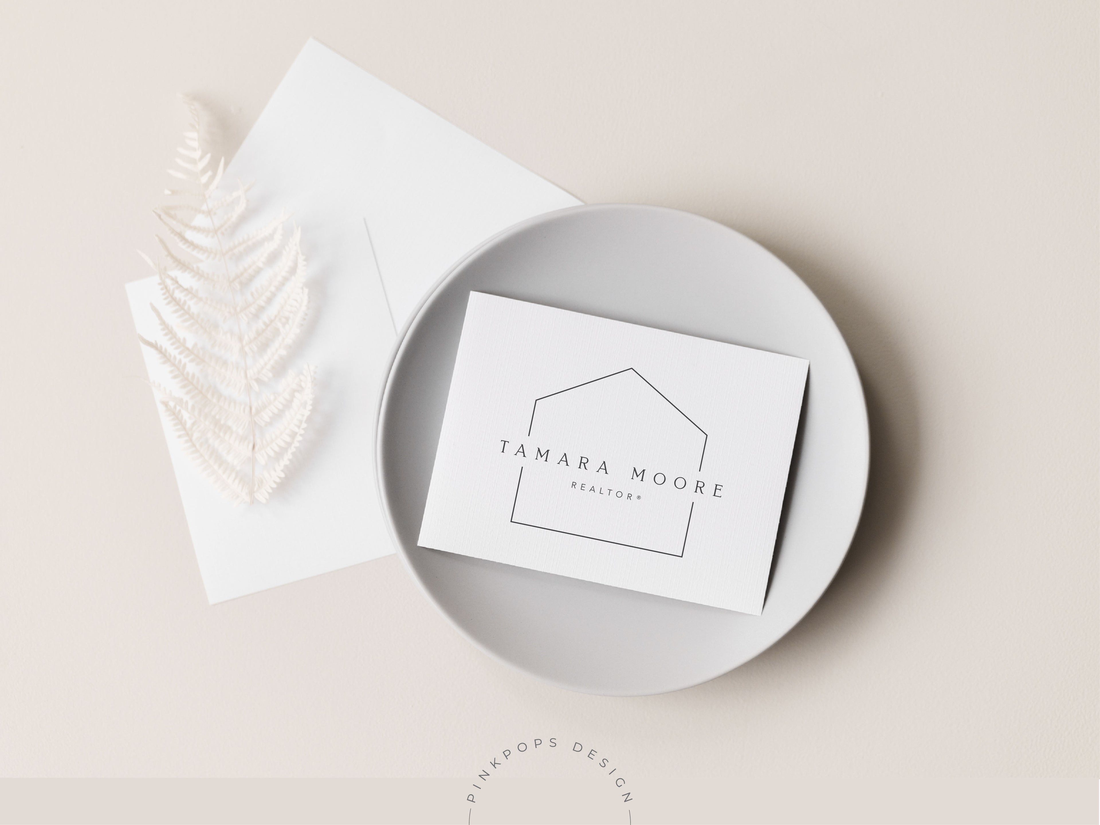 Real Estate Minimal Tamara Moore Logo Template - Clean and modern logo design featuring Tamara Moore, ideal for real estate professionals seeking a minimalistic yet impactful visual identity.